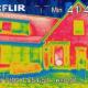 An infrared image of the exterior of a house showing heat loss.
